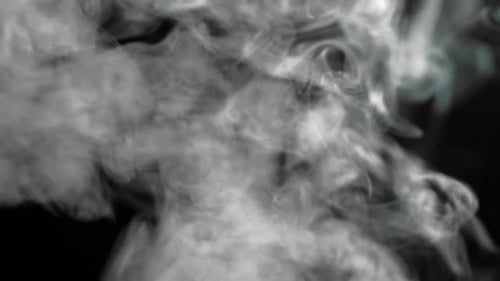 Abstract Grey Smoke on a Black Background