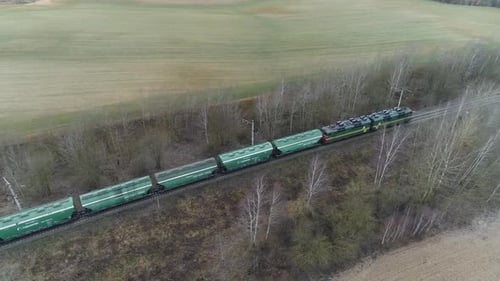 Countryside Freight Train Ride on Railroad Transports Gravel in Containers View From Height