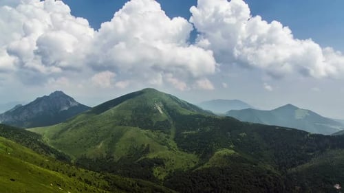 Clouds Towering in Mountains Before Storm