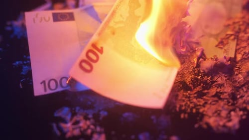 Euro Money Bills Burning in Macro Shot