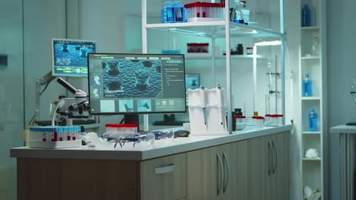 Medical Research Laboratory With Microscope and DNA Display