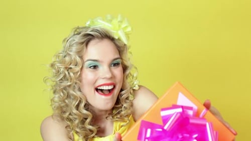 Woman Smiling with Birthday Gift