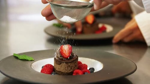 Powdered Sugar Sprinkled on Cake Dessert with Berries