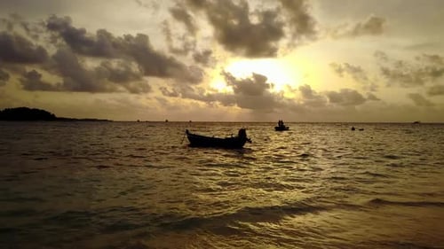 Aerial view landscape of relaxing tourist beach wildlife by blue sea with bright sandy background of