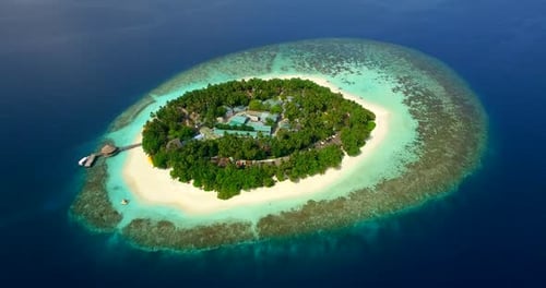 Aerial drone view of scenic tropical islands in the Maldives.