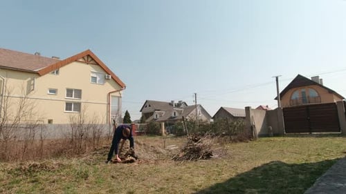 Worker Chopping Stump
