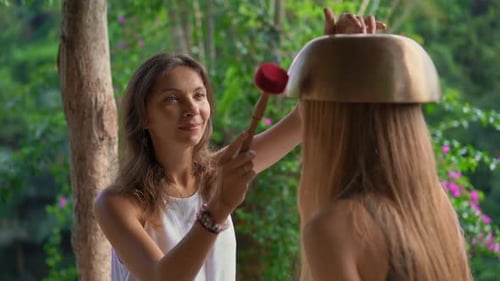 Women Practicing Sound Healing in Tropical Forest