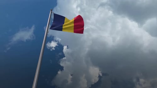 Chad or Romania National Flag Waving with Cloudy Sky