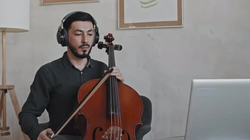 Cellist Plays Cello and Gives Online Lesson