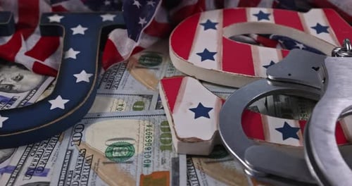 US Financial Regulation of Economic US Sanctions with USA Flag US Dollars Banknotes Handcuffs