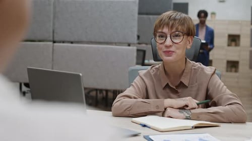 Business Colleagues Talking in Office