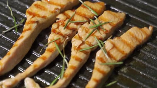 Close up of Salmon Cooking on Grill