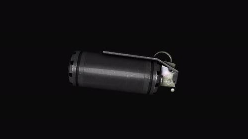 Tear-gas hand grenade rotation on grey background