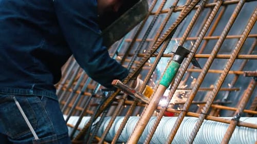 Blacksmith in Construction is Welding