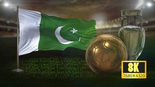 Pakistan Flag, Golden Soccer Ball, and Trophy on Stadium Field