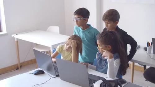 Classmates Doing School Task Together
