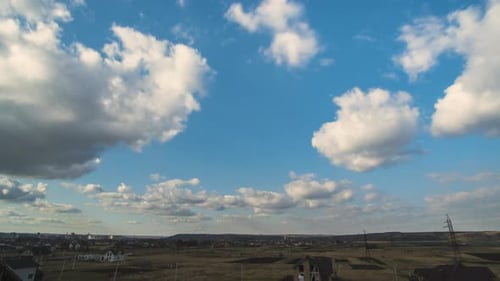 Clouds Moving Over Rural and Suburban Landscape