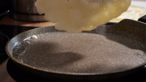 Pancake Cooking in Frying Pan