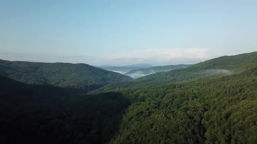 Aerial Landscape View of Caucasus Mountain at Sunny Morning with Fog