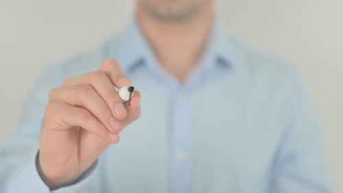 Hand Writes Business with Marker