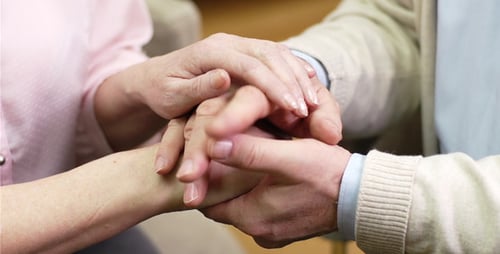 Close-up of Elderly Couple Holding Hands