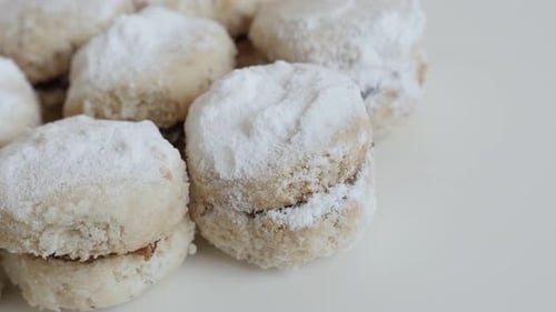 Panning over little vanilla dessert stuffed with jam close-up 4K 2160p 30fps UltraHD footage - Serb