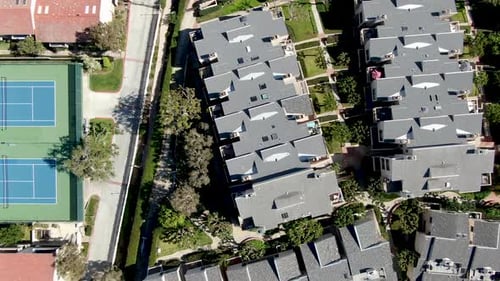 Aerial View of Typical Community Condo with Tennis Court and Pool. California