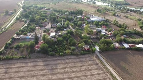 Mosque in the Middle of a Small Muslim Village in Large Plain