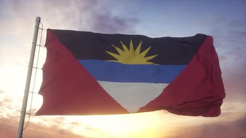Flag of Antigua and Barbuda Waving at Sunset