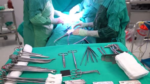 Surgeons Perform Operation in Hospital Operating Room