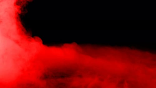 Red Smoke Flowing on Black Background