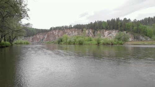 River with beautiful views of the hills and the forest