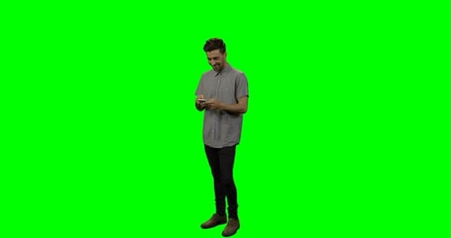 Happy Man Using Mobile Phone