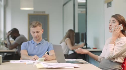 Business Woman Talking Aggressively on Mobile