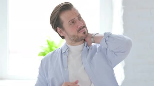 Adult Man Rubbing Sore Neck