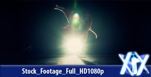 Breakdancer Performs Complex Moves in Dark Studio