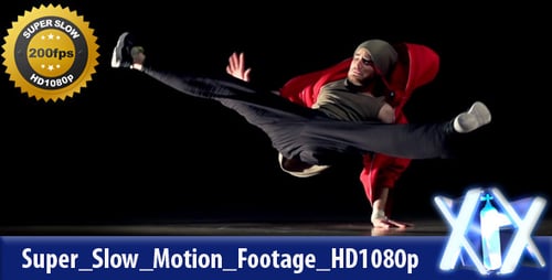 Male Breakdancer Performing Athletic Moves Against Black Background