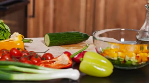 Preparing Fresh and Colorful Vegetable Salad in Kitchen
