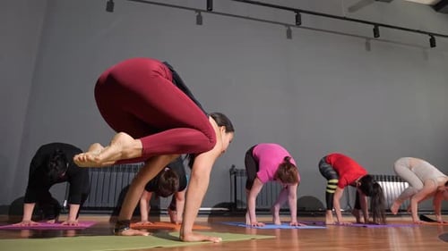 Yoga Class Balancing Poses at Studio Workout