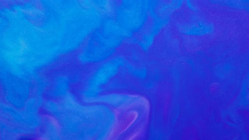 Flüssige blaue und violette Farbe