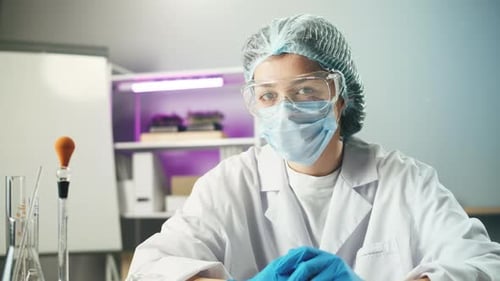 Medical Professional in Lab Wearing Protective Gear