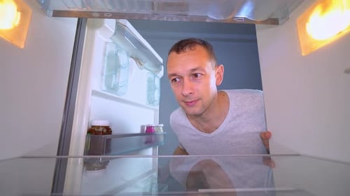 Man Opens Fridge, Shocked to Find it Empty