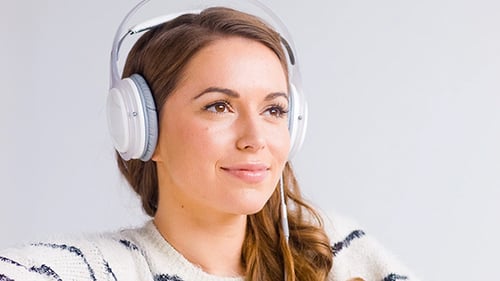 Cute Girl Listening To Music On Headphones