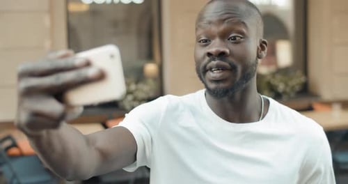 Man Talking On A Video Call In The City