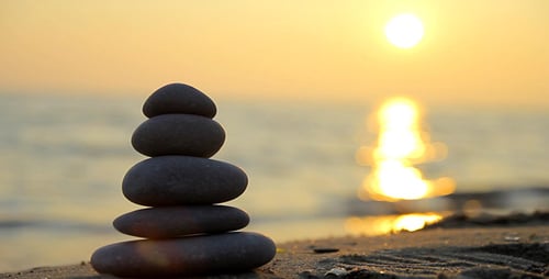 Stacked Stones And Sunset