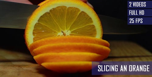 Slicing a Ripe Orange on Cutting Board