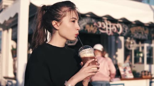 Lovely Girl with a Sweet Cocktail.