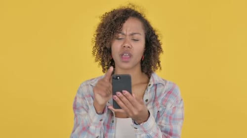 Woman Receives Bad News on Her Mobile Phone