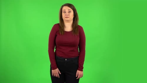 Perplexed Girl in Looking Camera, Pointing Herself, Say Who Me No Thanks i Do Not Need. Green Screen