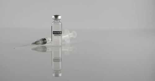 Covid-19 Vaccine Vial and Syringe Still Life